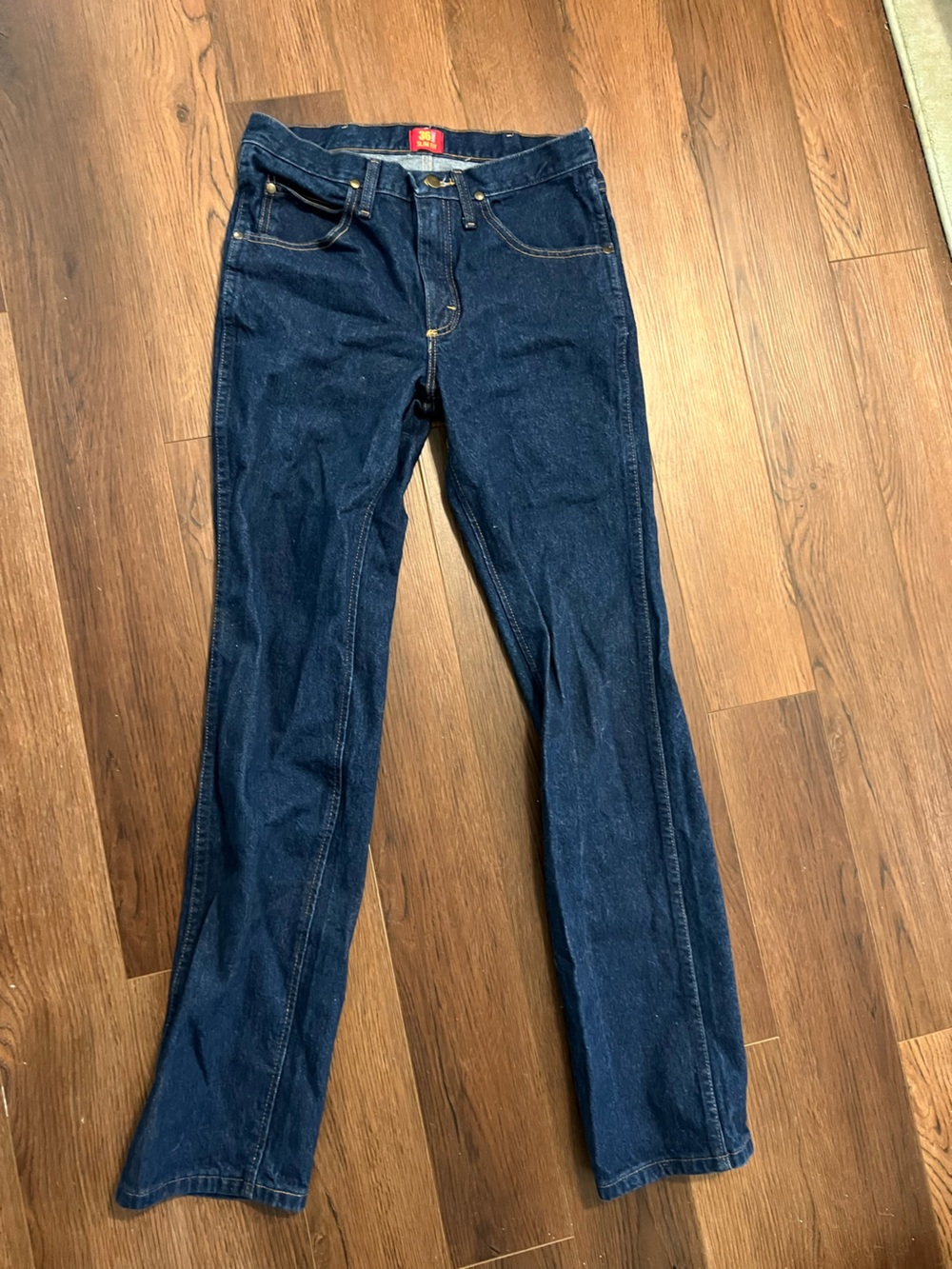 Wrangler Men's Slim fit cowboy cut Jeans in Dark Blue